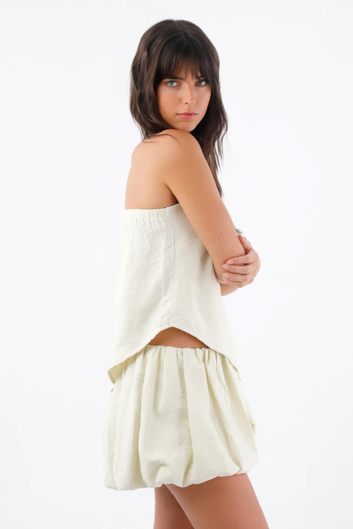 Ivory Strapless Top for Women in Lightweight Fabric with Asymmetrical Hem - Image 2